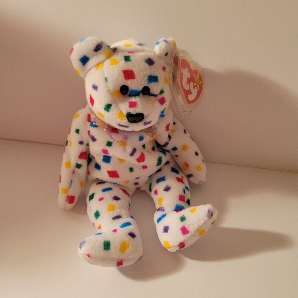 "Ty 2K" the Bear is a millennium-themed Ty Beanie Baby designed to celebrate the